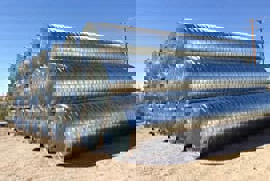 A stack of Contech corrugated metal pipe. 